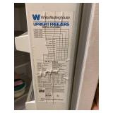 White Westinghouse upright freezer needs cleaned