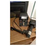 Sunpak Thyristor flash and Polaroid instant camera