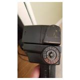 Sunpak Thyristor flash and Polaroid instant camera