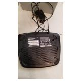 Linksys wireless router and 2 plastic storage containers