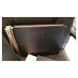 Ledger and 3 ring notebooks and empty Nikon case