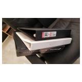 Ledger and 3 ring notebooks and empty Nikon case