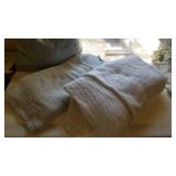 2 blankets, white and light blue