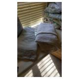 2 blankets, white and light blue