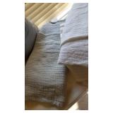 2 blankets, white and light blue