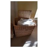 Wicker hamper and 2 twin mattress pads