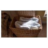 Wicker hamper and 2 twin mattress pads