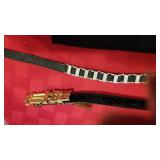 Rai Freed snakeskin belt, belts, clutch and makeup bag