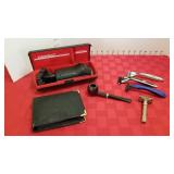 Norelco electric razor, travel kit, razors and pipe