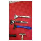 Norelco electric razor, travel kit, razors and pipe