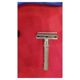 Norelco electric razor, travel kit, razors and pipe