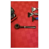 Norelco electric razor, travel kit, razors and pipe