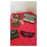 Glasses and clip on sunglasses and cleaner