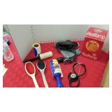 Omron arm cuff, stethoscope, lint brushes and heat lamp