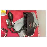 Omron arm cuff, stethoscope, lint brushes and heat lamp