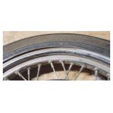 Used Harley Davidson Dunlop D401F 100/90-19 M/C 57H Front Motorcycle Tire mounted on a spoked chrome rim w/brake plates