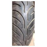 New Avon AM23 V260 140/80 VB16 Rear Motorcycle Tire mounted on a spoked chrome rim