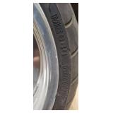 Used Metzeler ME 880 Marathon Steel Radial 240-40 R 18 m-c (79V) Rear Motorcycle Tire mounted on a solid chrome rim