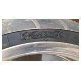 Used Metzeler ME 880 Marathon Steel Radial 240-40 R 18 m-c (79V) Rear Motorcycle Tire mounted on a solid chrome rim
