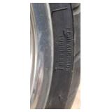 Used Metzeler ME 880 Marathon Steel Radial 240-40 R 18 m-c (79V) Rear Motorcycle Tire mounted on a solid chrome rim