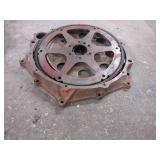 Early Chevrolet cast iron power glide transmission adaptor and flywheel with flex plate