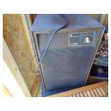 West Half of Contents of Shed-Steamer, Vacuum, Cabinet, etc. - shelves not included