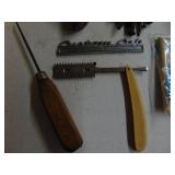 Box of primitives-scraper, date nails, razor, etc.