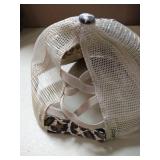 Criss Cross Ponytail Hat Washed Distressed Mesh Womens Baseball Cap Dad Hat Ponytail Hat for Women varies from stock photo