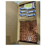 Fasade Traditional Style/Pattern 1 Decorative Vinyl 18in x 24in Backsplash Panel in Moonstone Copper - 5 Pack Retail: $101.99