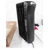 Amazon Basics Portable Digital Radiator Heater with 7 Wavy Fins and Remote Control, Black, 1500W