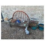 Garden Bench (sturdy), Sheppherds Hook, Flowerpots, Concrete Rabbit (Ears have been mended), Birdhouse, and Watering Can