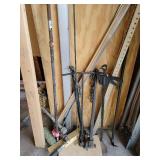 Contents of Corner (Wood, Wood Clamp, Crowbar, and Metal)