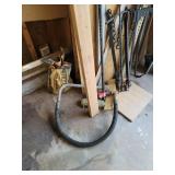 Contents of Corner (Wood, Wood Clamp, Crowbar, and Metal)