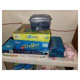 Shelf with Contents (games, backpack, and stuffed lamb)