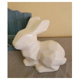 Ceramic Rabbit, Candle in Dish, and Wooden Shelf