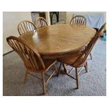 Solid Oak Dining Table with 6 Chairs (Shown with leaf in place) 48 x 72 x 29 with leaf and 48" round without leaf