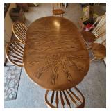 Solid Oak Dining Table with 6 Chairs (Shown with leaf in place) 48 x 72 x 29 with leaf and 48" round without leaf