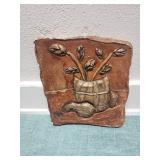 Old handmade clay wall decor