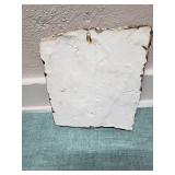 Old handmade clay wall decor