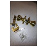 Kwikset Tylo Hall/Closet Passage Door Knob in Polished Brass