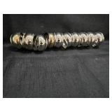 Silver tone Napkin Rings with Star Pattern - Set of 10 Silver tone Napkin Rings with Star Pattern - Set of 10