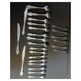 Ornate Silver-Plated Flatware Set with Decorative Pattern Ornate Silver-Plated Flatware Set with Decorative Pattern