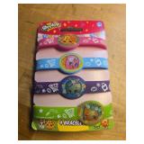 4pc Shopkins Stretchy Silicone Bracelets Gift Set D Lish Donut Apple Blossom - Retail: $22