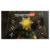 LED Projector Christmas Tree Topper Star with Holiday Patterns - Retail: $29
