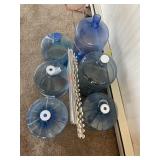 6 Water Jugs & Plastic Decorative Fencing