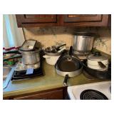 Large lot of baking ware, pots, pans, more