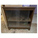 2 Drawer glass front cabinet w/contents