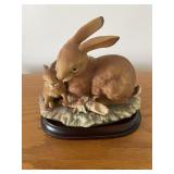 Homco rabbits on wood stand