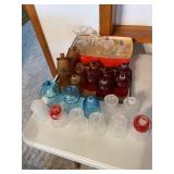 4 groupings of candle votive holders & candles