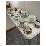 2 rows souvenir cups & saucers
